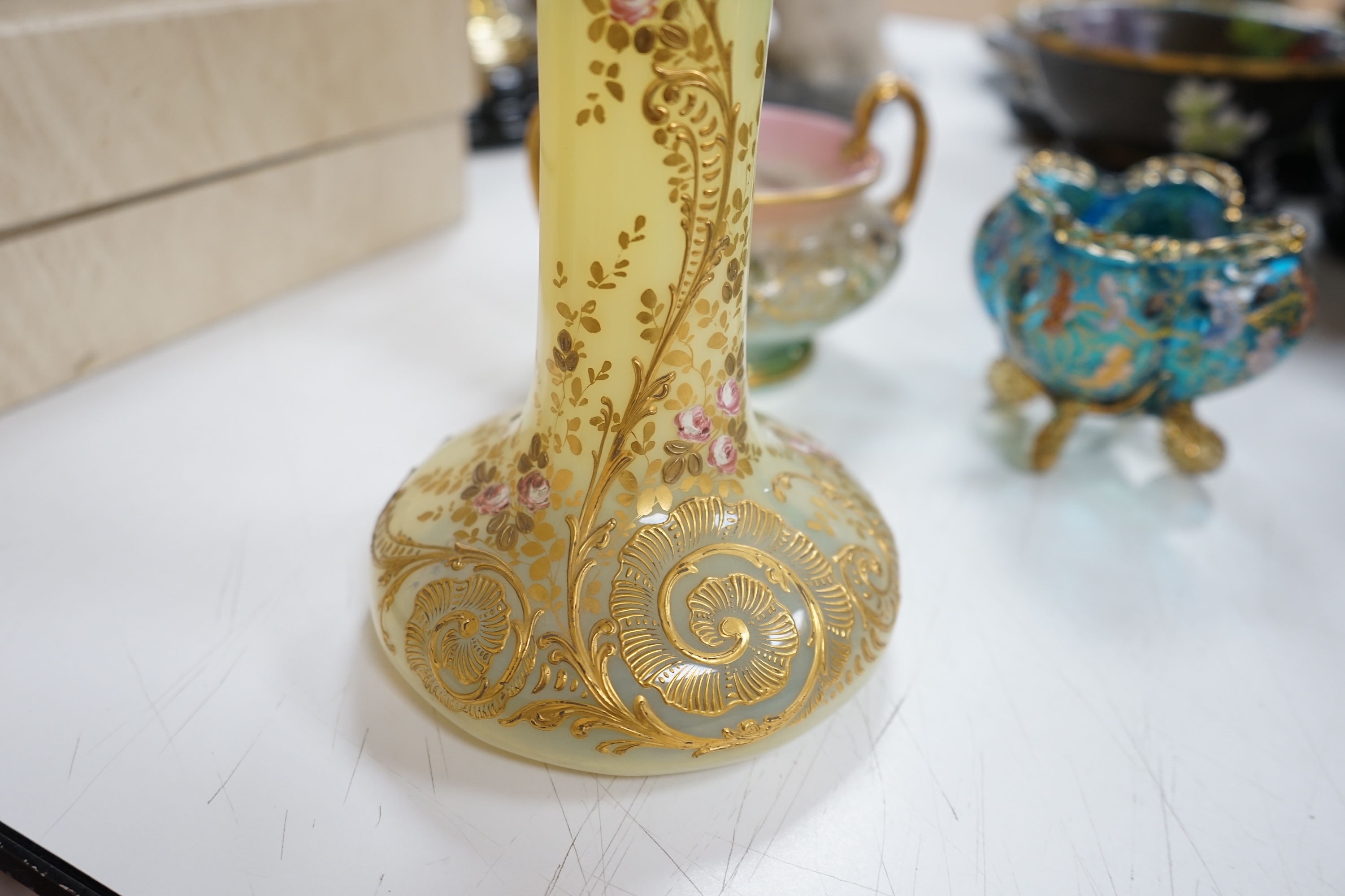 Three Bohemian gilt decorated glass vessels, including two Moser bowls and a tall Vaseline vase, 34.5cm high. Condition - good.